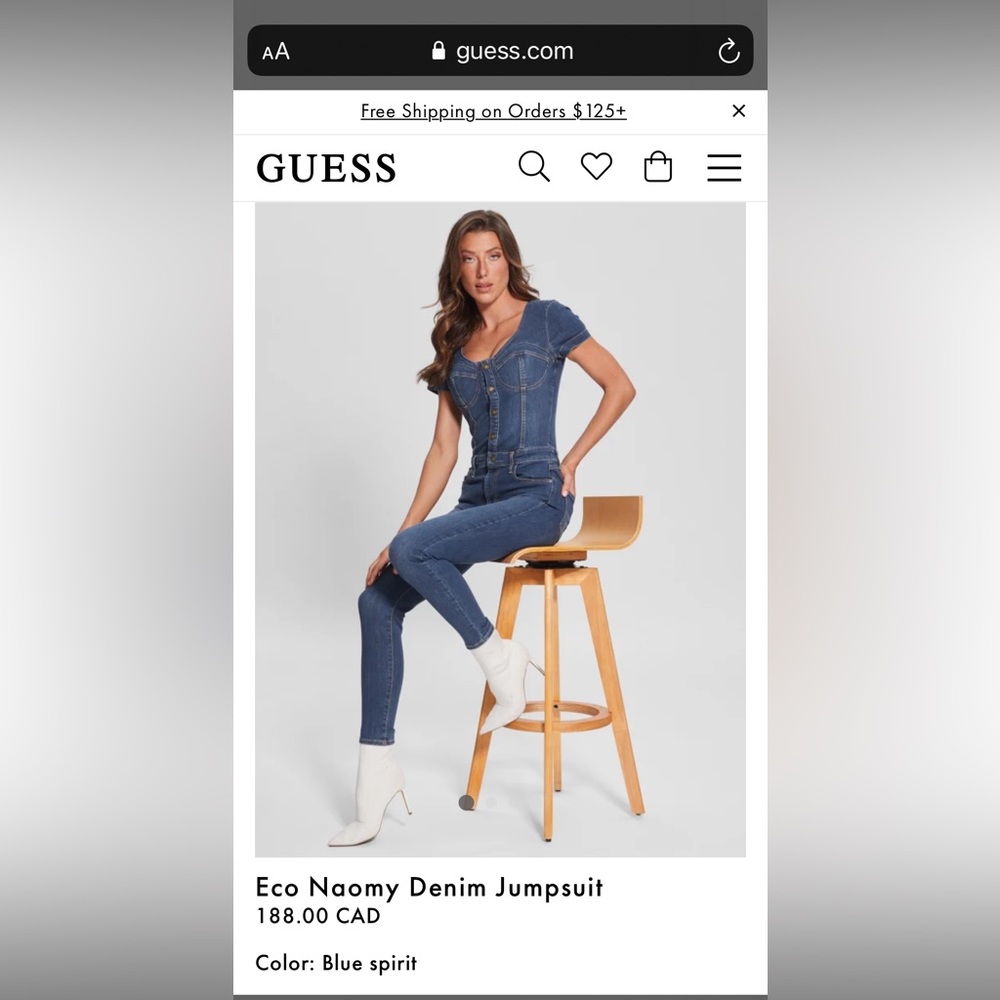 Guess denim jumpsuit in medium size NWOT